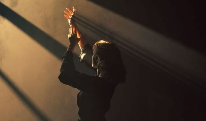 image of a women seeking light